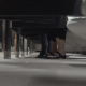 A camera placed under the stall in a public restroom captures multiple women sitting on the toilet. One seemingly cute girl enters a nearby stall, drops her shorts to her ankles and sits down on the toilet. Presented in 720P HD video. 6 minutes long.